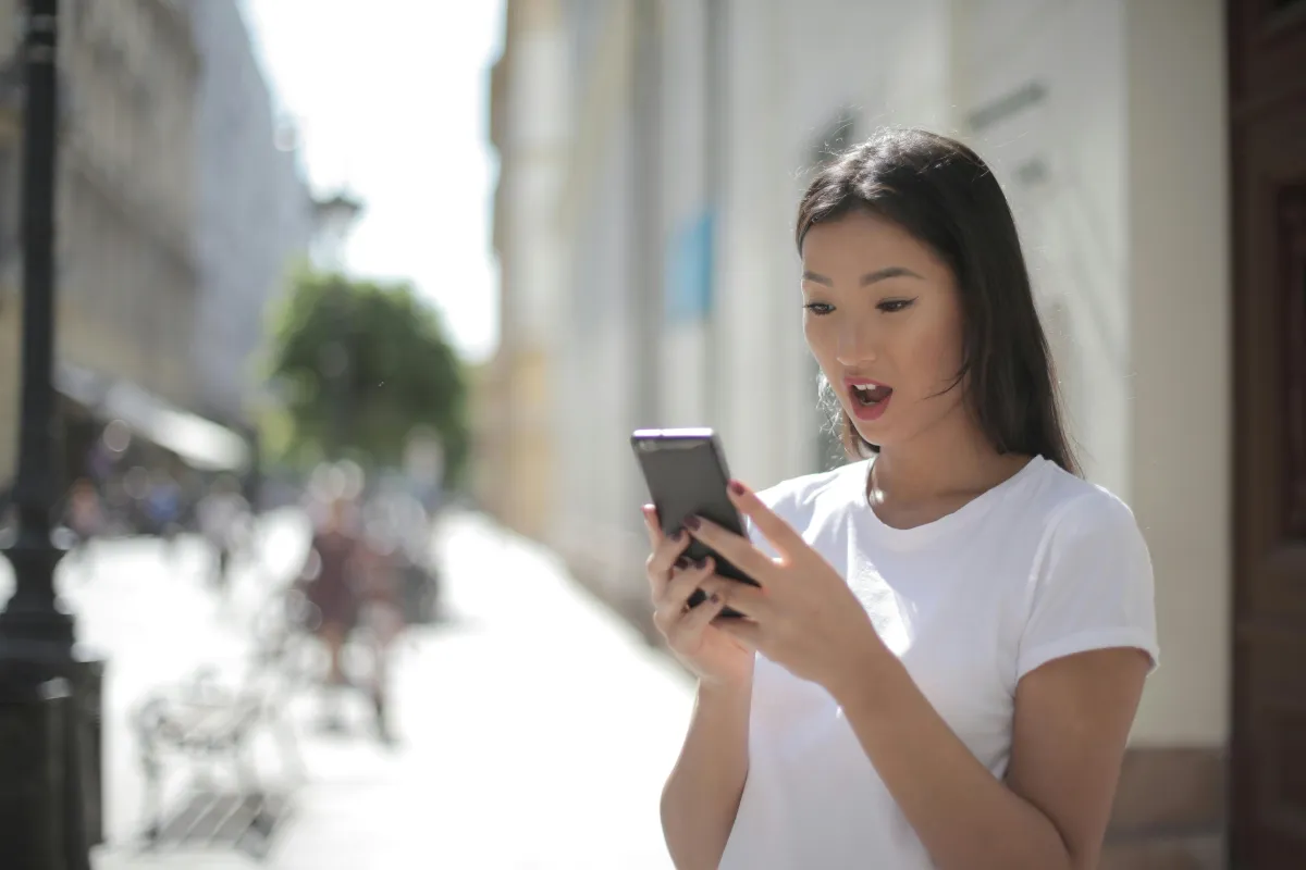 Smartphone showing social media feed
